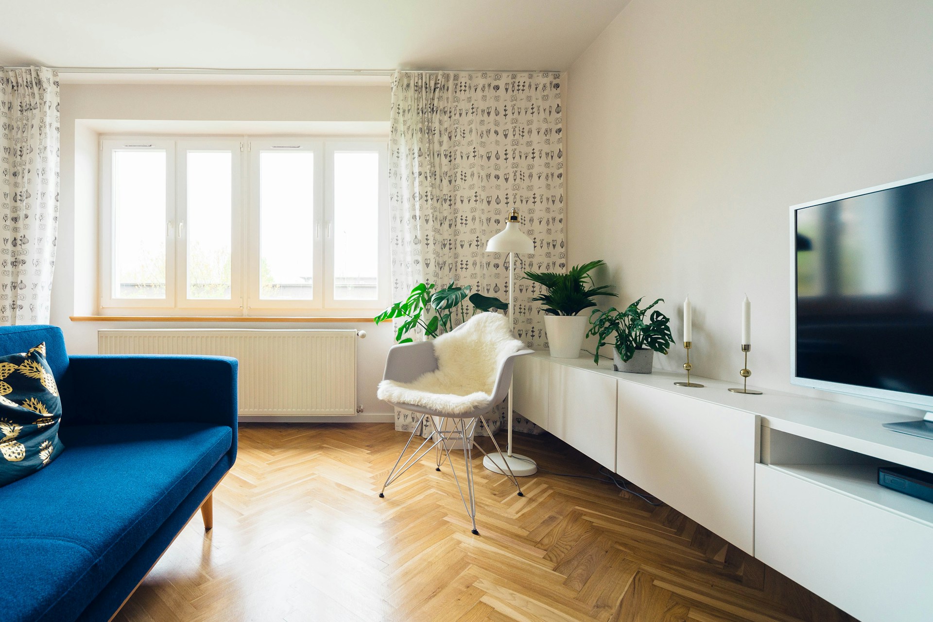 Nordic linen throw and cushions styled on a neutral sofa - best budget home decor pick